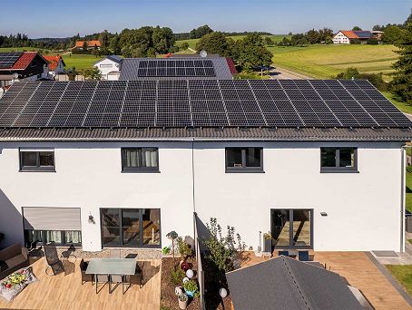 Bodenmüller STREIF-Erfahrungen Doppelhaus mit Photovoltaikanlage