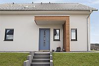 Hausbau mit STREIF Bewertung Referenz Koch Eingang mit Vordach modernes Einfamilienhaus