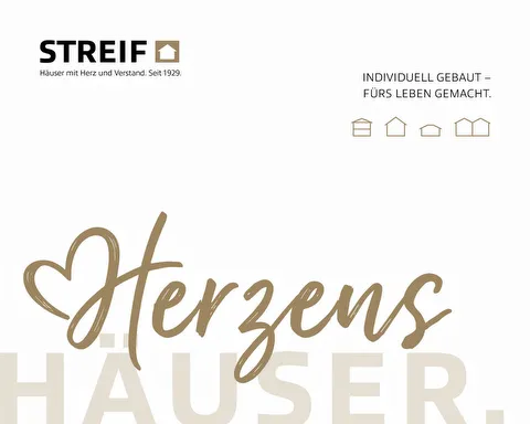 STREIF Herzenshäuser Katalog liegt auf weißem Tisch mit Schriftzug und schlichtem Titelbereich